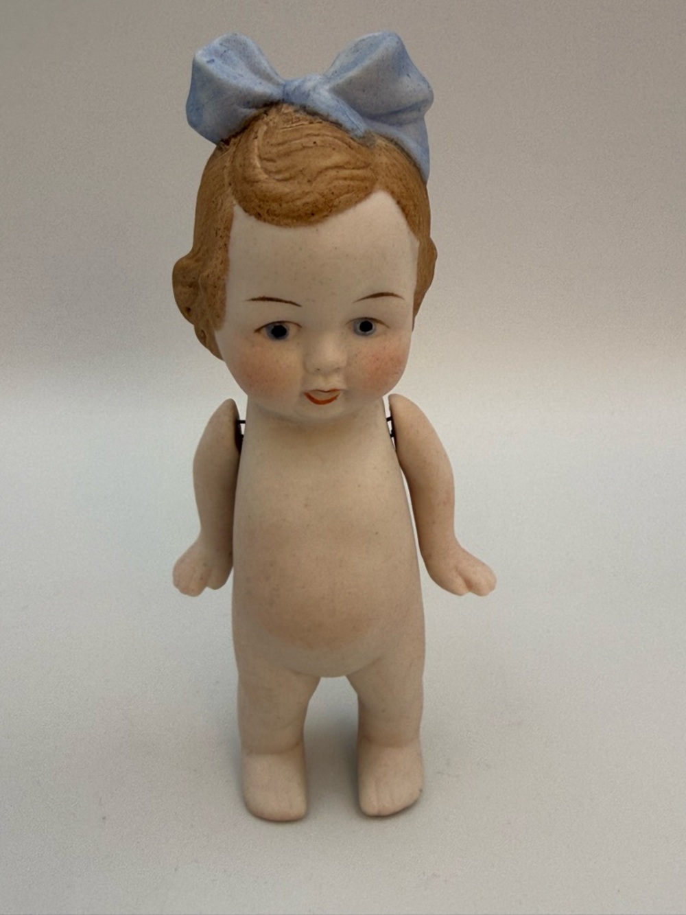 Antique Bisque Kewpie Flapper Doll Strung Arms Brown Hair Blue Bow 5”
